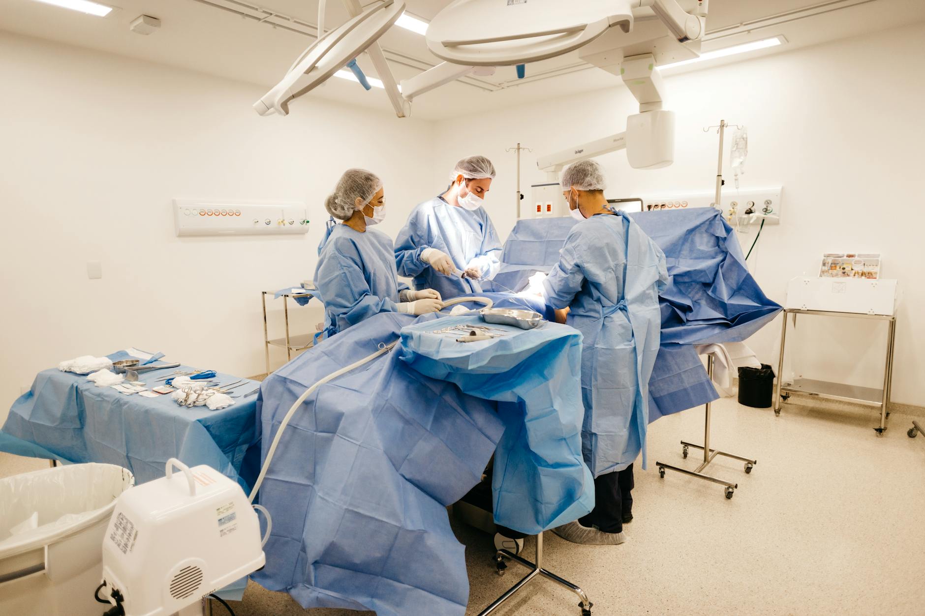 doctors in surgery room